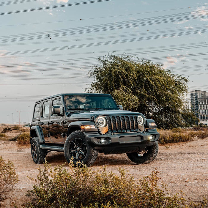 Three quarters view of a Jeep Wrangler equipped with Oculus Headlights.