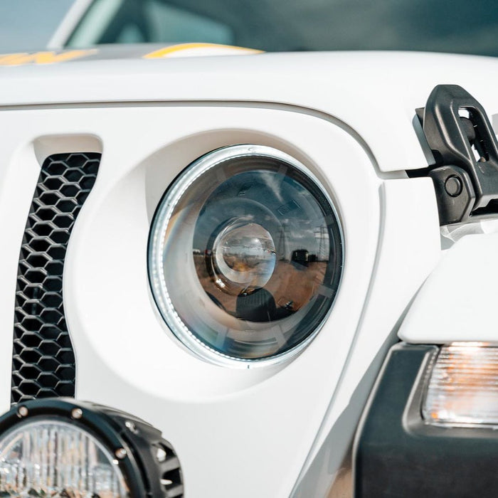 Extreme close-up of an Oculus Headlight installed on a Jeep.