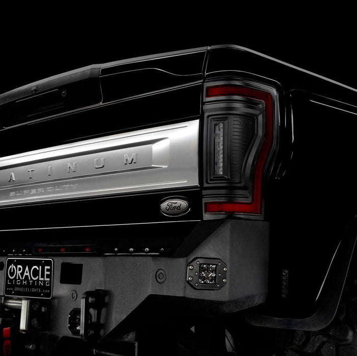 Close up on the rear end of a black Ford Superduty, with Flush Mount Tail Lights installed.