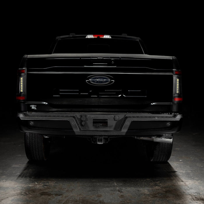 Straight rear view of black Ford F-150 with Flush Style LED Tail Lights installed