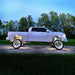 Side profile view of a white truck with white LED wheel rings.