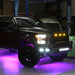 Ford Raptor with rock lights installed, set to pink.