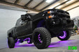 Black truck with purple LED wheel rings.