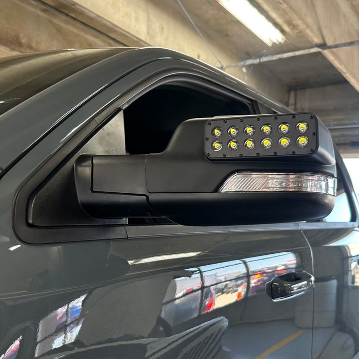 Front view of LED Off-Road Side Mirror Ditch Lights installed on a RAM TRX.