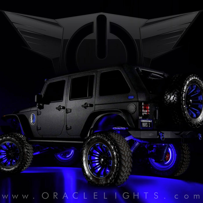 Black Jeep with blue LED wheel rings.