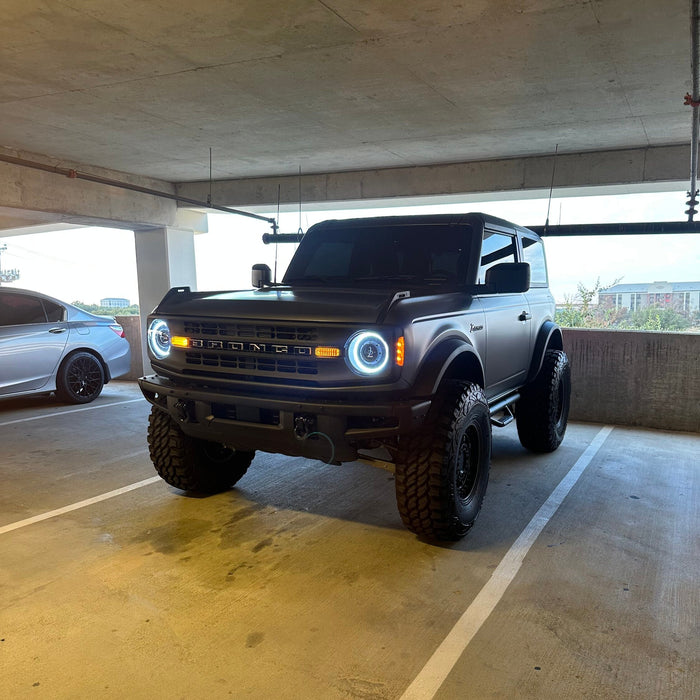 Ford Bronco in a parking garage, with Oculus Headlights turned on.