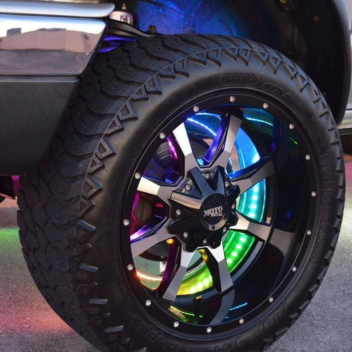 Close-up of a wheel with dynamic colorshift wheel rings installed, with rainbow LEDs.