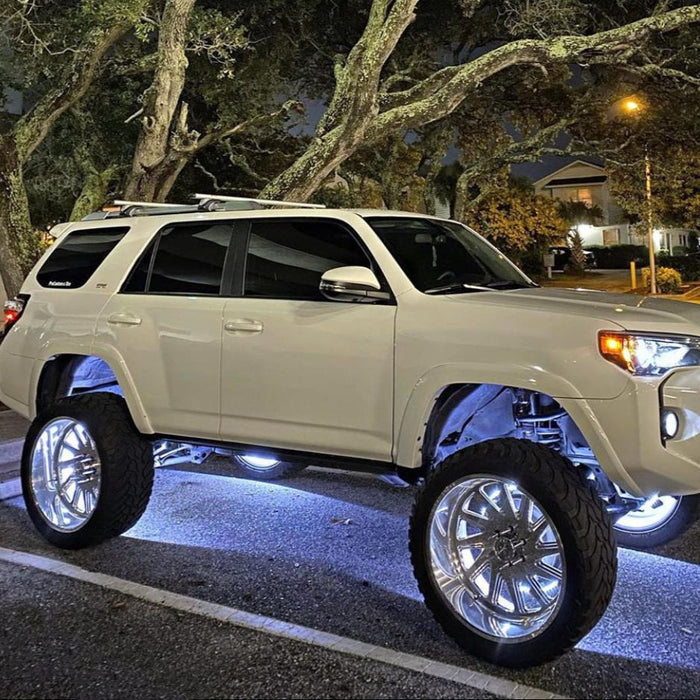 White toyota with white LED wheel rings.