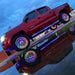 A red Toyota Tacoma with rainbow LED wheel rings.