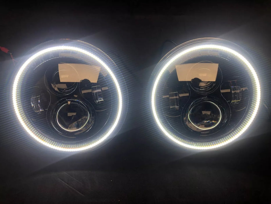 USED ORACLE 7" HIGH POWERED BLACK LED HEADLIGHTS WITH WHITE HALOS 5769-001