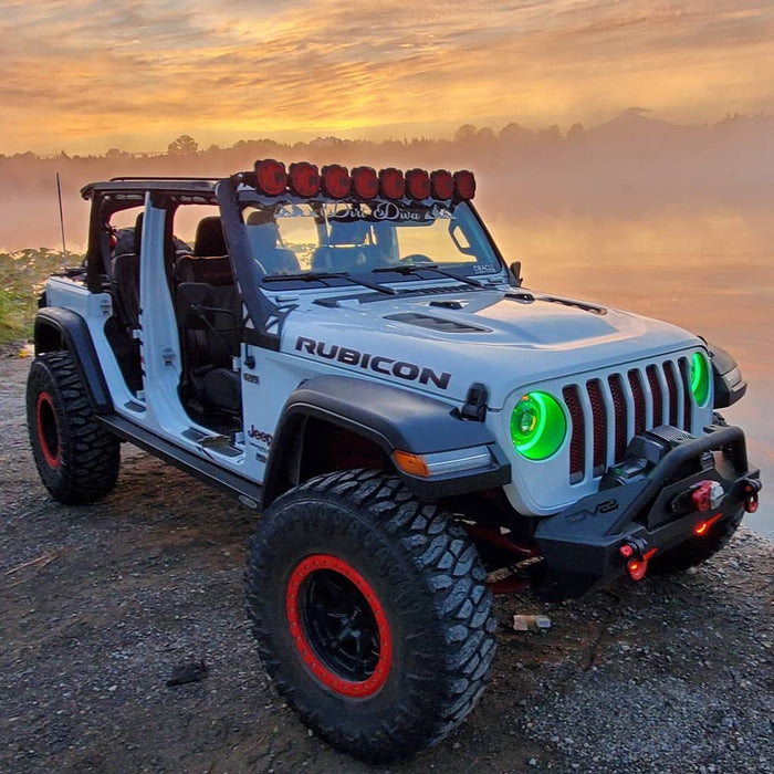 Three quarters view of a Jeep parked by the water, with ColorSHIFT Oculus Headlights installed.