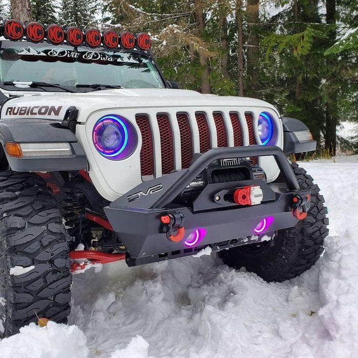 Front end of a Jeep Wrangler JL with ColorSHIFT Oculus Headlights installed.