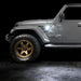 Side view of a Jeep with Sidetrack™ LED Lighting System installed, and set to white LED mode.