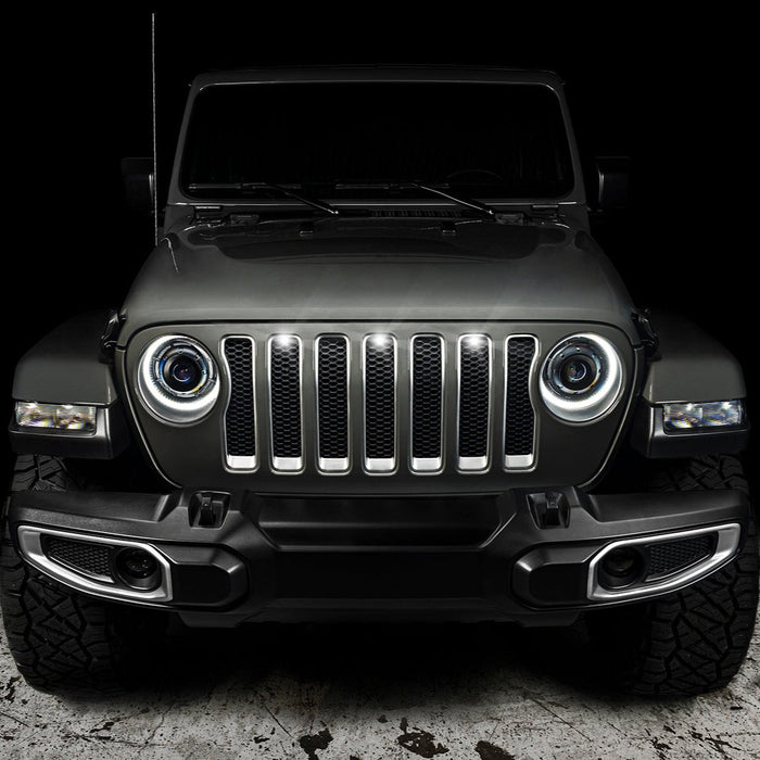 Front end of a Jeep Wrangler with white LED Grill Light Kit installed.