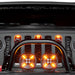 Front grill of a Jeep Wrangler with Universal Pre-Runner Style LED Grill Light Kit installed and amber LEDs turned on.