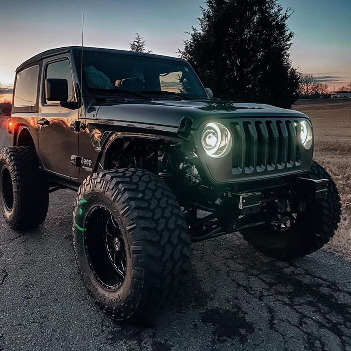 Three quarters view of a Jeep Wrangler equipped with Oculus Headlights.