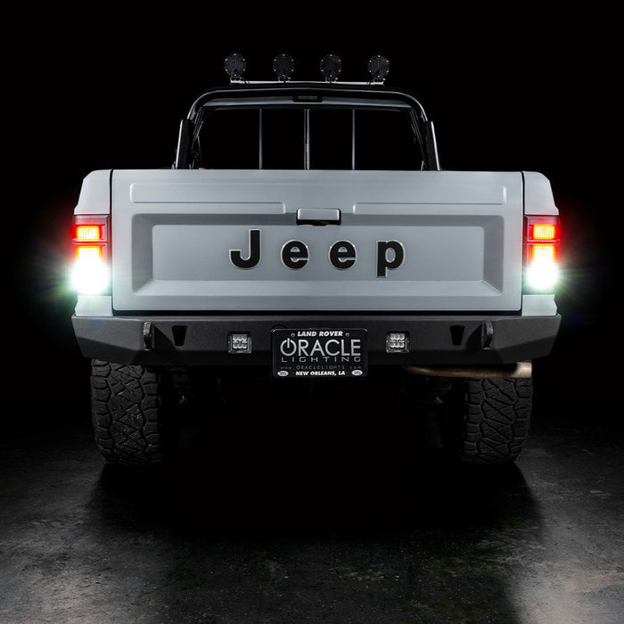 Rear view of Jeep Comanche with flush mount tail lights and reverse lights turned on