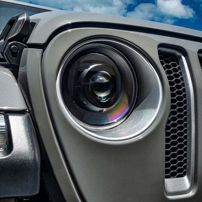 Extreme close-up of an Oculus Headlight installed on a Jeep.