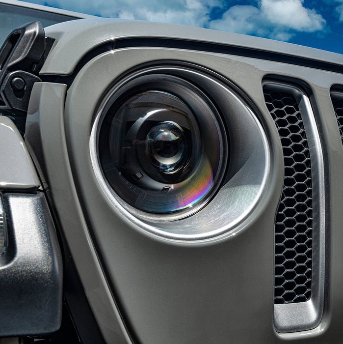 Extreme close-up of an Oculus Headlight installed on a Jeep.