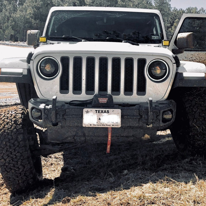 Front end of a Jeep with Oculus Headlights installed.