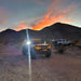 ORACLE Lighting Bronco with amber LED lighting products in the desert with silver truck.