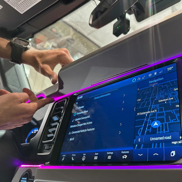 Close-up on the console of a Ford Bronco, with purple fiber optic lighting installed.