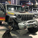 Jeep Wrangler in a showroom with Oculus Headlights installed.