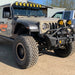 Three quarters view of a Jeep Gladiator with multiple LED lighting products installed, including "Smoked Lens" LED Front Sidemarkers.