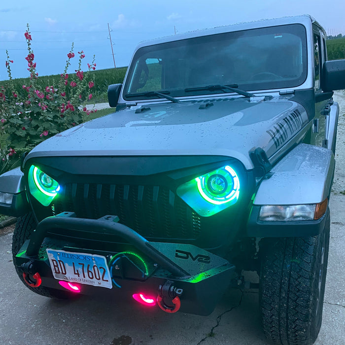 Front end of a Jeep with ColorSHIFT Oculus Headlights installed.