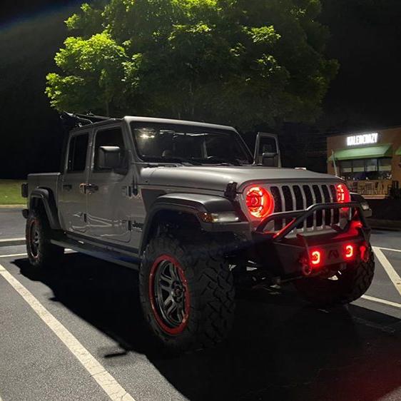 Three quarters view of a Jeep Gladiator JT, with ColorSHIFT Oculus Headlights installed.