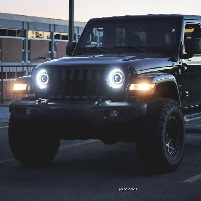 Three quarters view of a Jeep Wrangler JL with bright LED Oculus Headlights installed.