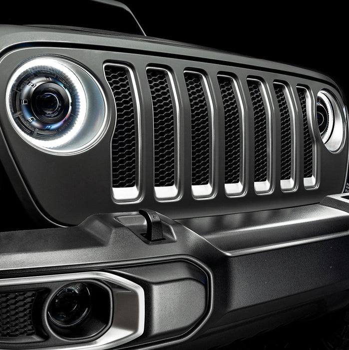 Close-up on the front end of a Jeep with Oculus Headlights installed.