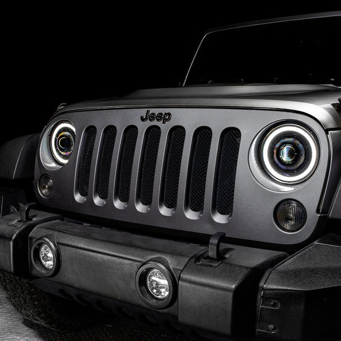 Front end of a Jeep Wrangler JK with 7" Oculus Headlights installed.