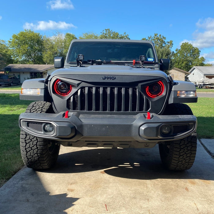 Front of a Jeep with ColorSHIFT Oculus Headlights installed.