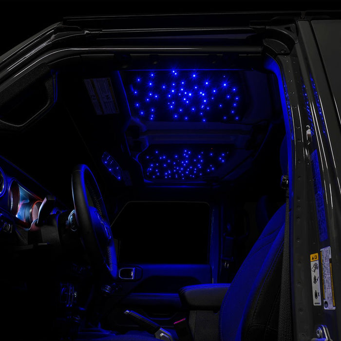 Jeep interior with StarLINER Fiber Optic Hardtop Headliner installed on the roof panels, set to blue LEDs.