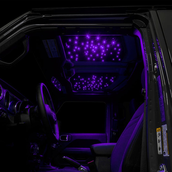 Jeep interior with StarLINER Fiber Optic Hardtop Headliner installed on the roof panels, set to purple LEDs.