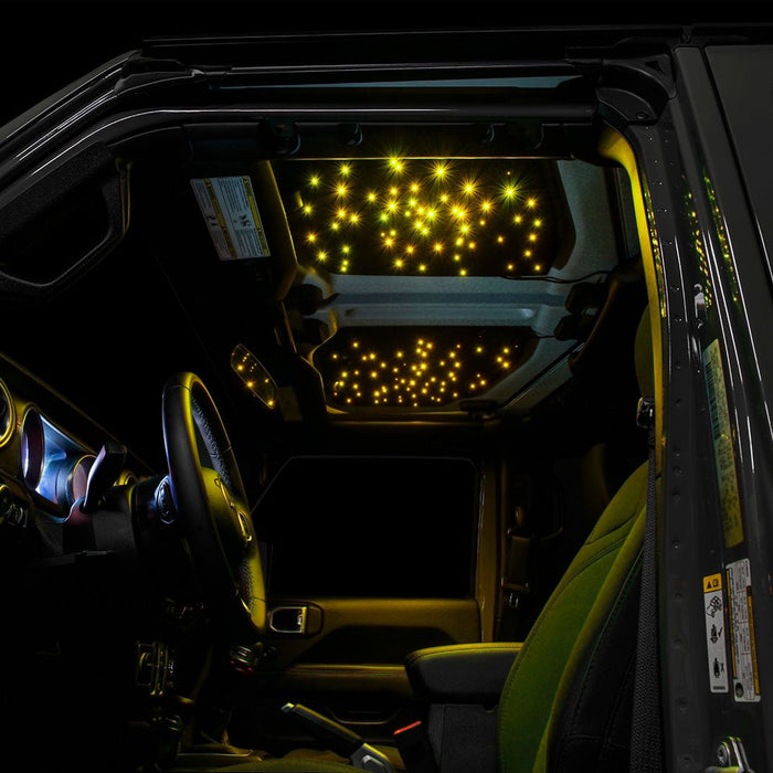 Jeep interior with StarLINER Fiber Optic Hardtop Headliner installed on the roof panels, set to yellow LEDs.