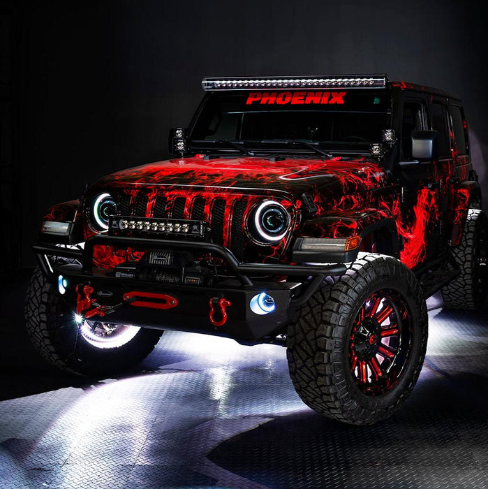 Three quarters view of a red Jeep Wrangler JL with Oculus Headlights installed.